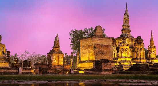 Iconic Ayutthaya ruins at sunset for a vibrant Ayutthaya Tours banner with Legend Travel Group.